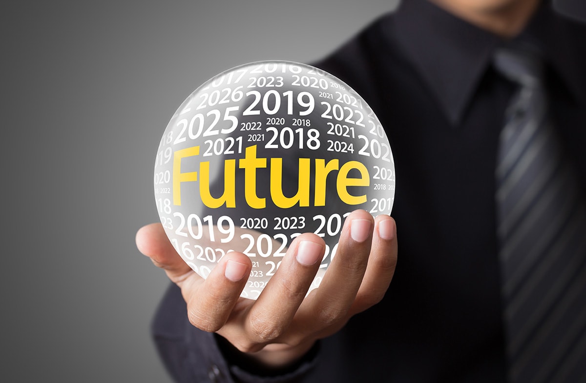 Fundraising Blog 92 Businessman holding a glass ball,foretelling the future.